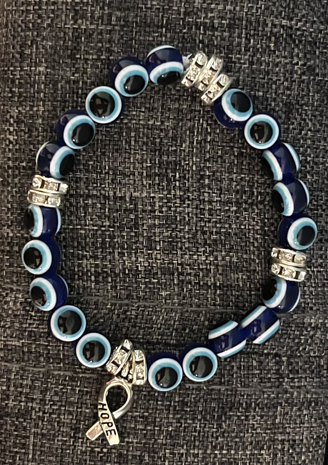 Evil eye bracelet with Hope charm